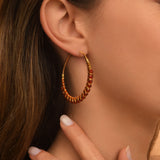 Boucles d'oreilles créoles Panarea tissées de cornaline - orange Cornaline