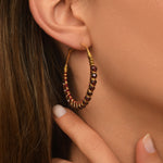 Boucles d'oreilles créoles Panarea tissées de grenat - rouge Grenat