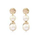 Boucles d'oreilles clips pendantes Lucy perles de coton et métal doré - blanc Blanc