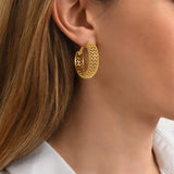 Boucles d'oreilles créoles Betty en métal doré ciselé - doré Dore