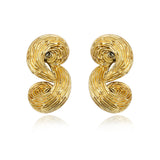 Boucles d'oreilles clips Zaza spirales de résine métallisée - doré Dore