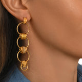 Boucles d'oreilles longues à tiges percées Alicudi anneaux en métal doré émaillé- doré Dore