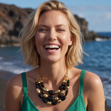 Collar babero Loulou – negro y dorado
